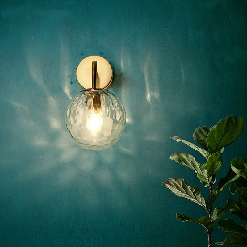 Contemporary Textured Globe Wall Light with Brass Arm | Single-Bulb Sconce for Bedroom, Hallway & Living Room | Hardwired Electric Fixture | Thomler