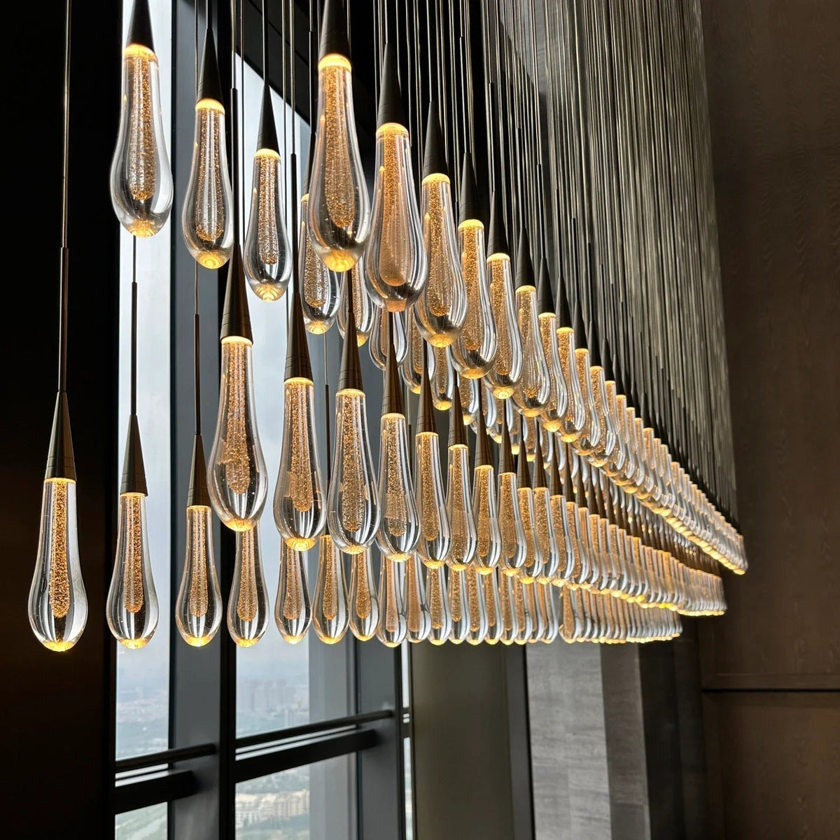 Cascading Raindrop Linear LED Chandelier – Textured Glass Orbs, Adjustable Height, Vaulted Ceiling Ready – 37 to 120 Inch Options for | Thomler