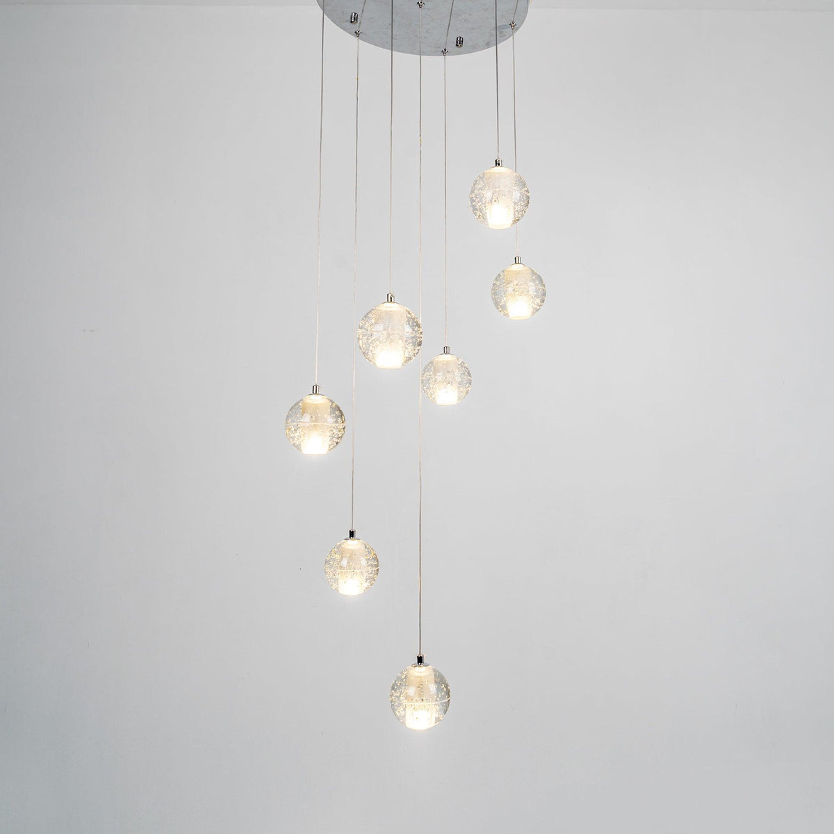 Spherical Glass Globe Multi-Drop Hanging Fixture – Adjustable Stairwell & Entryway Chandelier with Chrome Hardware | Thomler