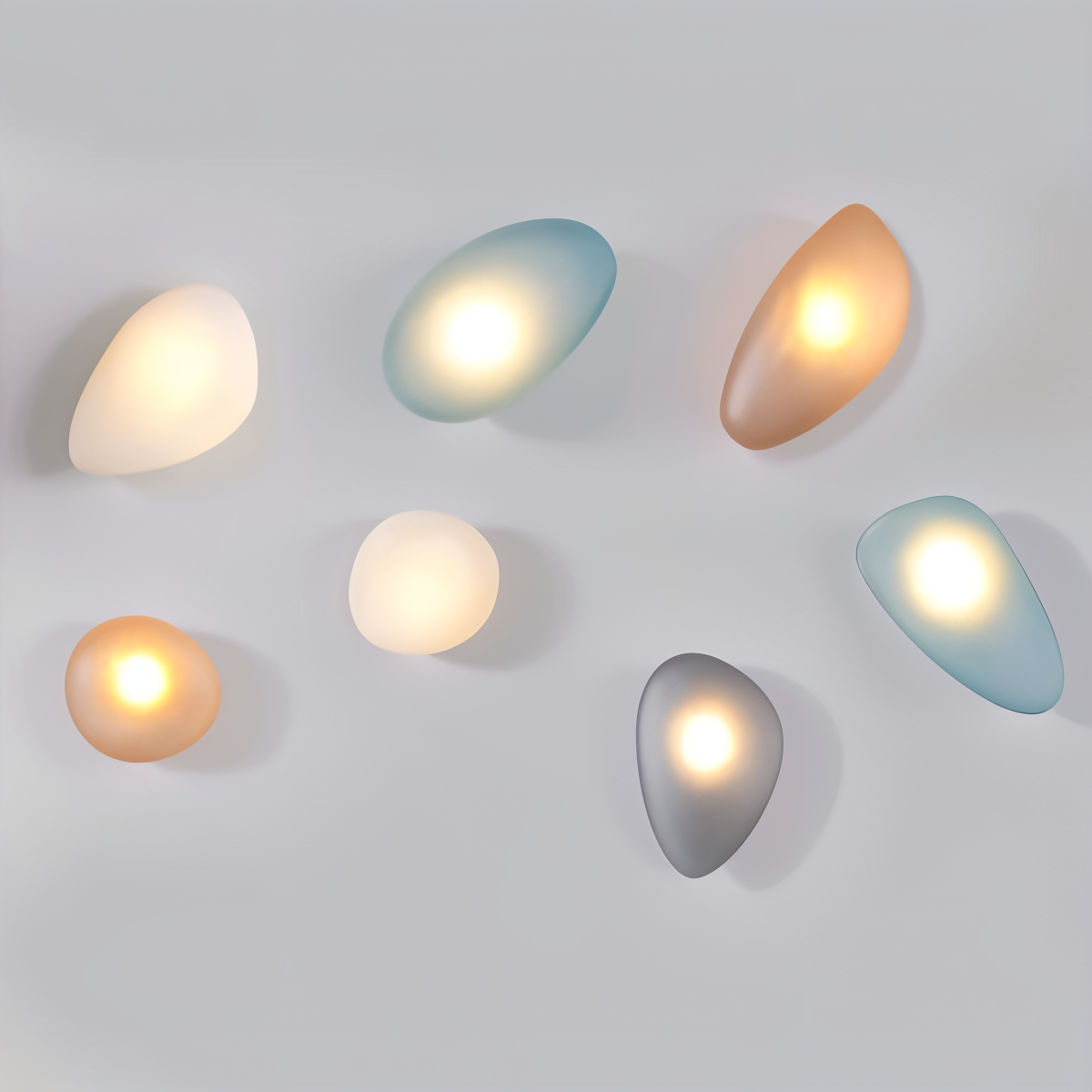 Glass Pebble-Shaped LED Wall Sconce – Warm White Light, Modern Minimalist Design for Living Room, Bedroom, Hallway – Blue, Amber, Smoke | Thomler