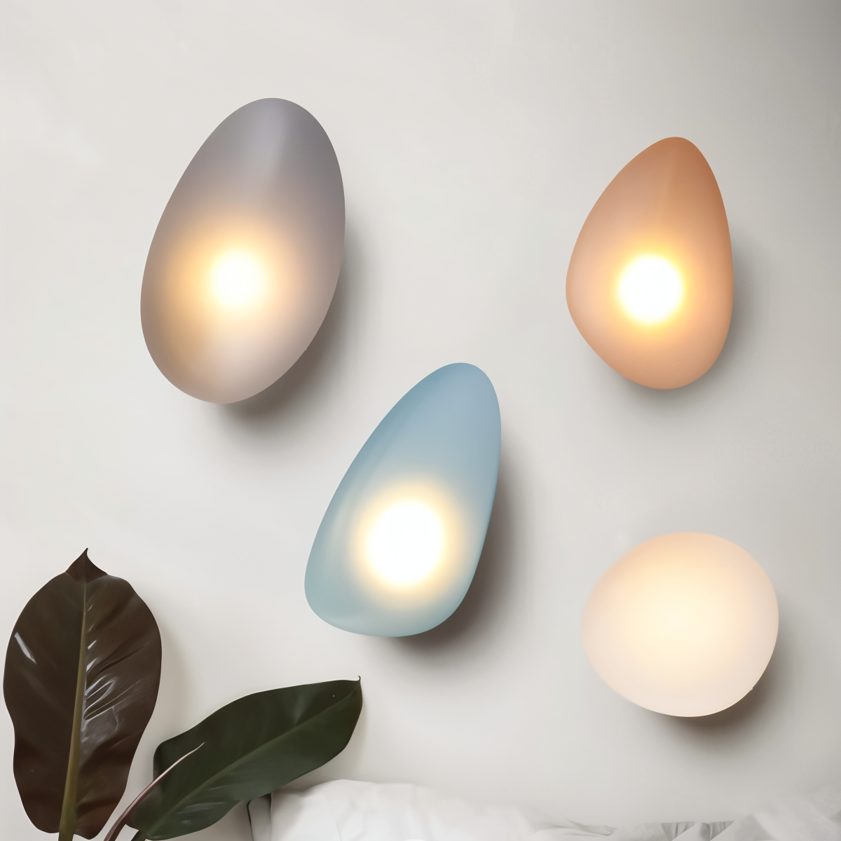 Glass Pebble-Shaped LED Wall Sconce – Warm White Light, Modern Minimalist Design for Living Room, Bedroom, Hallway – Blue, Amber, Smoke | Thomler