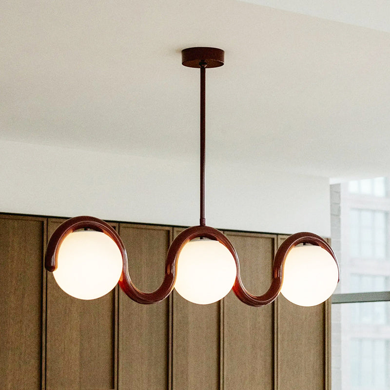 Modern Linear Chandelier with Curved Metal Frame & Glass Sphere – Art Nouveau Pendant Light for Dining Room | Thomler