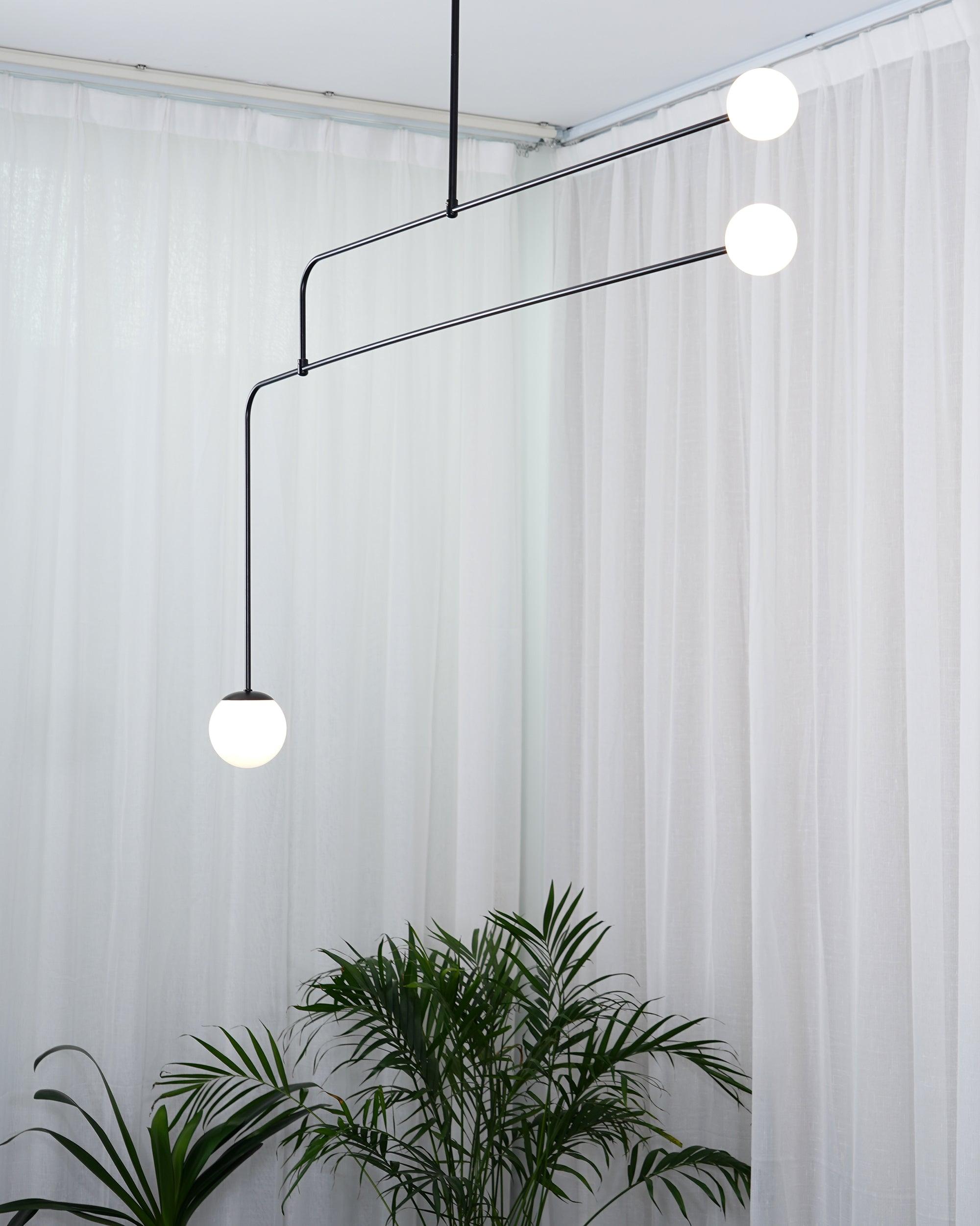 Mobile Chandelier 55.1 in L x 33.5 in H Patinated Brass Black Modern Living Room Ceiling Light Minimalist Glass Diffuser Fixture | Thomler
