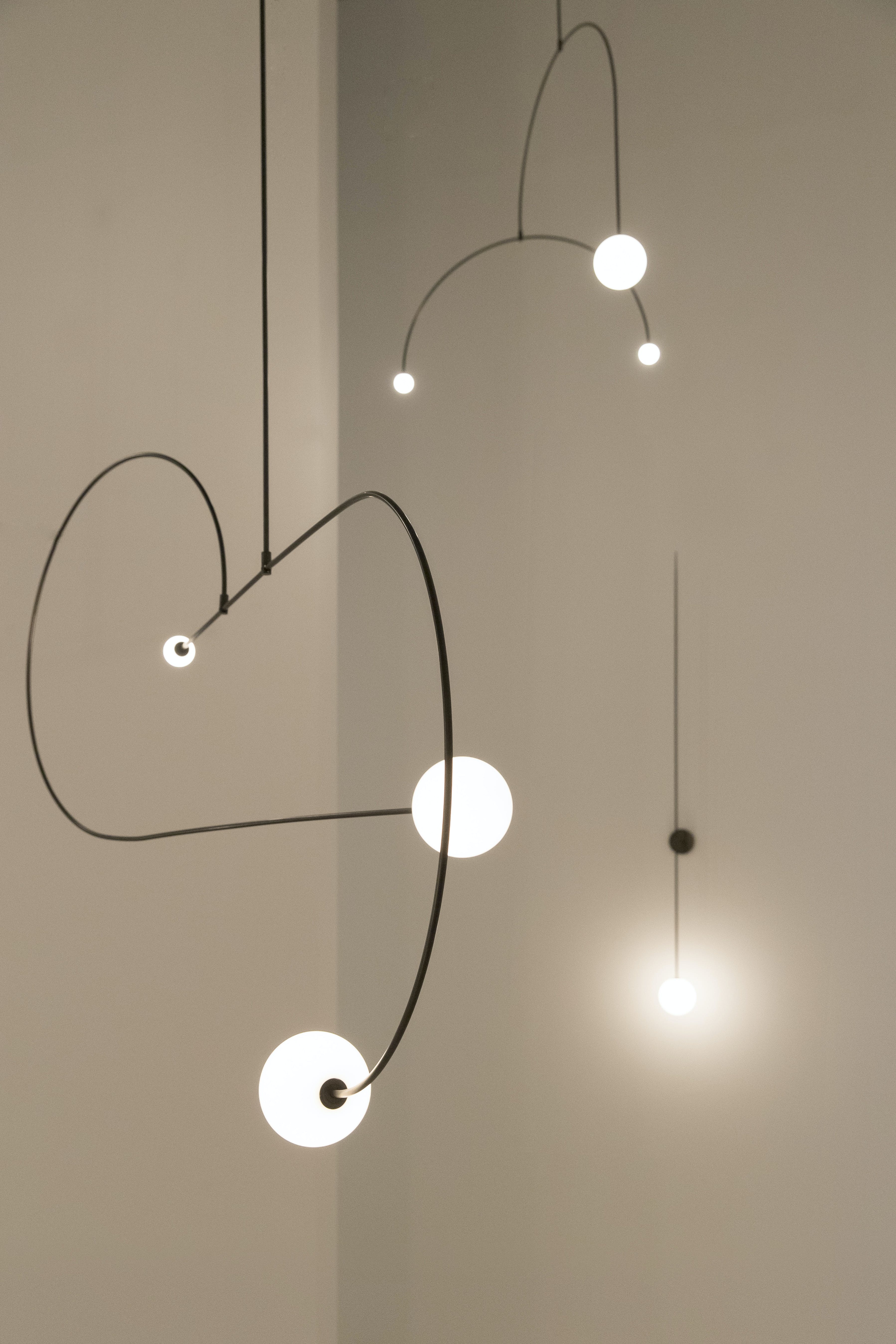 Mobile Chandelier 55.1 in L x 33.5 in H Patinated Brass Black Modern Living Room Ceiling Light Minimalist Glass Diffuser Fixture | Thomler
