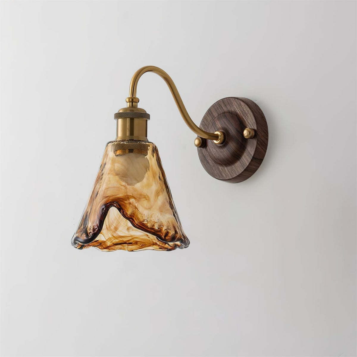 Vintage Amber Glass Wall Sconce with Wood-Tone Finish and Brass Accents | Thomler