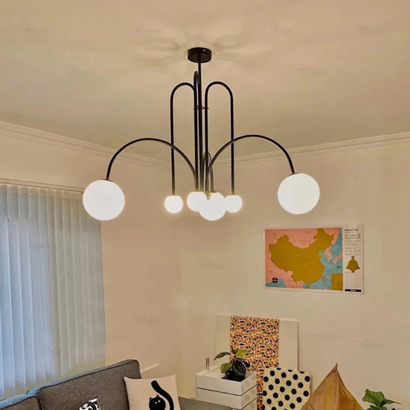 Contemporary Frosted Globe Chandelier with Curved Metal Arms – Modern Statement Lighting for Dining Room & Entryway | Thomler
