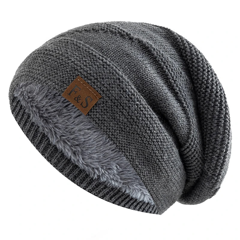 Relaxed Fit Knit Beanie with Plush Fleece Lining for Men & Women – Cold-Weather Slouch Cap with Badge Detail | Thomler