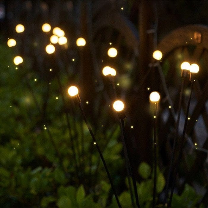 Motion Solar Stake Light with Flexible LED Strands for Garden & Lawn Pathway Lighting | Thomler
