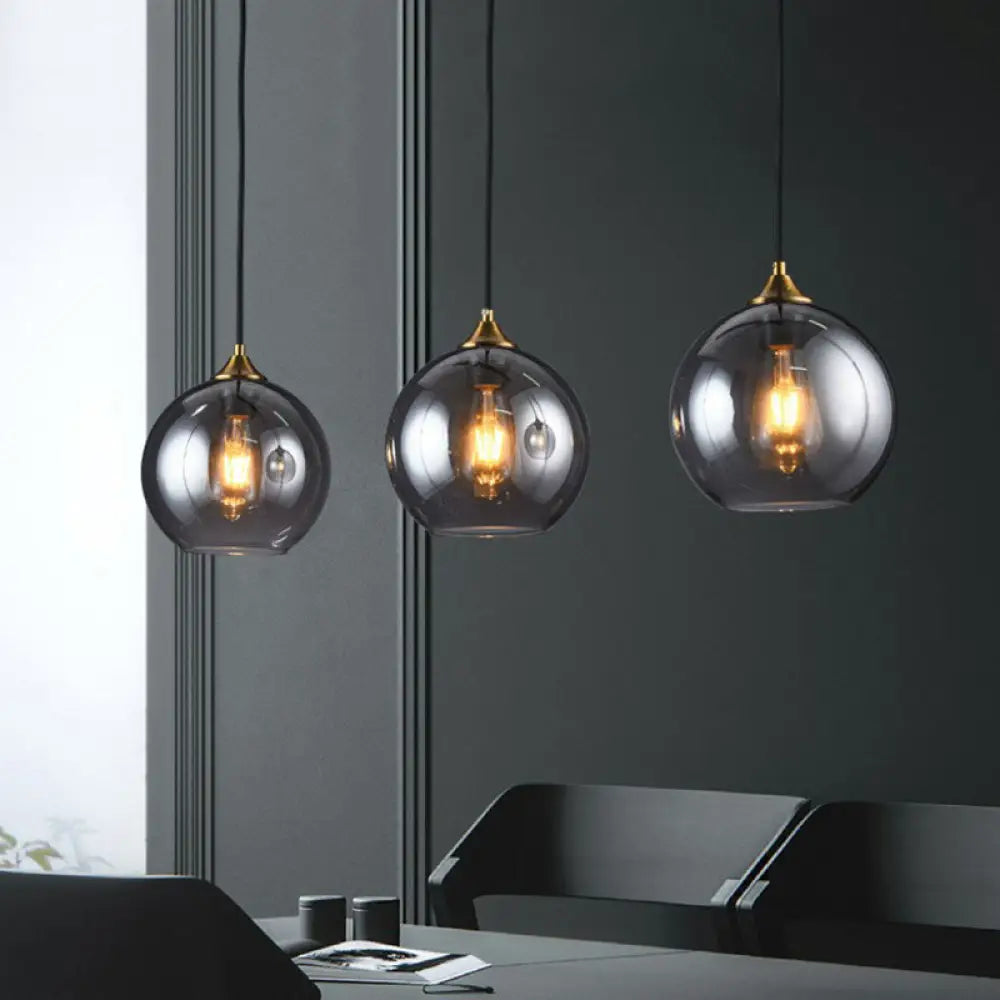 Three-Light Hanging Ceiling Fixture with Tapered Glass Globes in Antique Brass Finish for Dining Room Kitchen Island | Thomler
