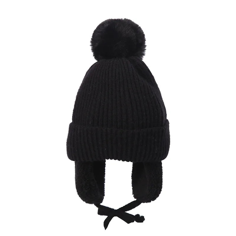 Plush-Lined Toddler Winter Cap with Chin Tie and Ear Covers – Warm Knitted Cold-Weather Headwear for Boys and Girls Age 2-8 | Thomler