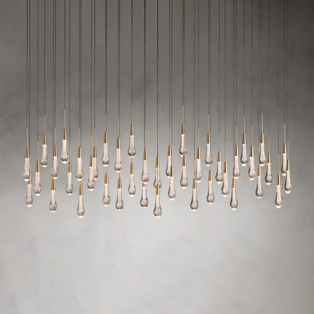 Cascading Raindrop Linear LED Chandelier – Textured Glass Orbs, Adjustable Height, Vaulted Ceiling Ready – 37 to 120 Inch Options for | Thomler
