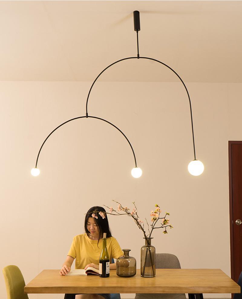 Mobile Chandelier 55.1 in L x 33.5 in H Patinated Brass Black Modern Living Room Ceiling Light Minimalist Glass Diffuser Fixture | Thomler