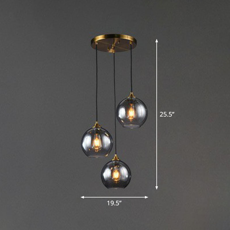 Three-Light Hanging Ceiling Fixture with Tapered Glass Globes in Antique Brass Finish for Dining Room Kitchen Island | Thomler