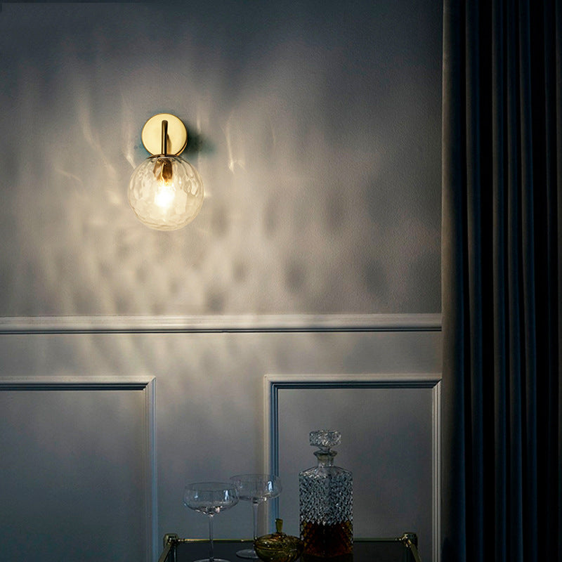 Contemporary Textured Globe Wall Light with Brass Arm | Single-Bulb Sconce for Bedroom, Hallway & Living Room | Hardwired Electric Fixture | Thomler