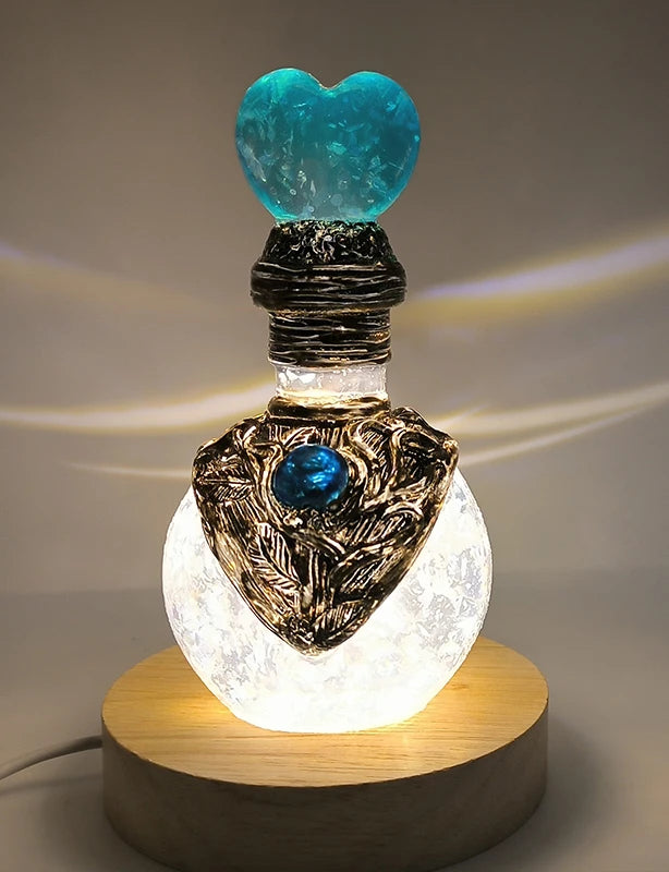 Celestial Elixir Vial Figurine – Fantasy Resin Ornament with Ocean-Inspired Shimmer for Shelf & Desk Décor | Thomler