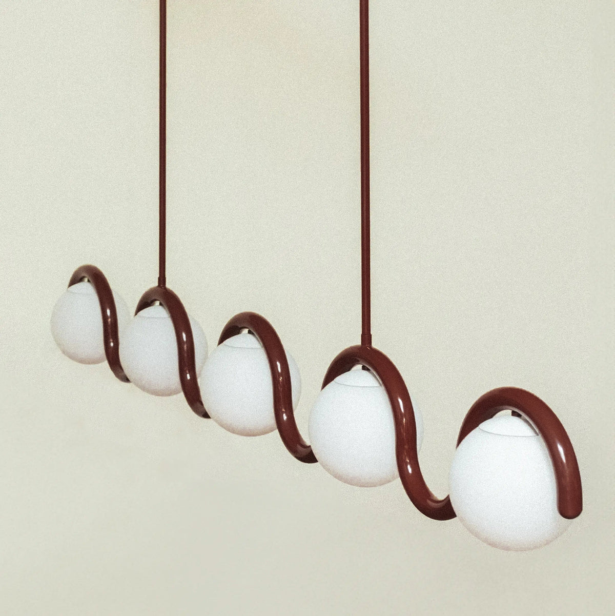 Modern Linear Chandelier with Curved Metal Frame & Glass Sphere – Art Nouveau Pendant Light for Dining Room | Thomler