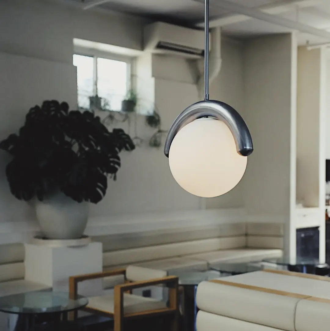 Modern Linear Chandelier with Curved Metal Frame & Glass Sphere – Art Nouveau Pendant Light for Dining Room | Thomler