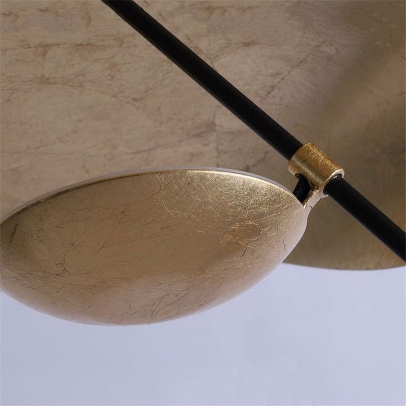 Modern Twisted Metal Hanging Fixture in Three Finishes for Dining Room & Living Space | Thomler