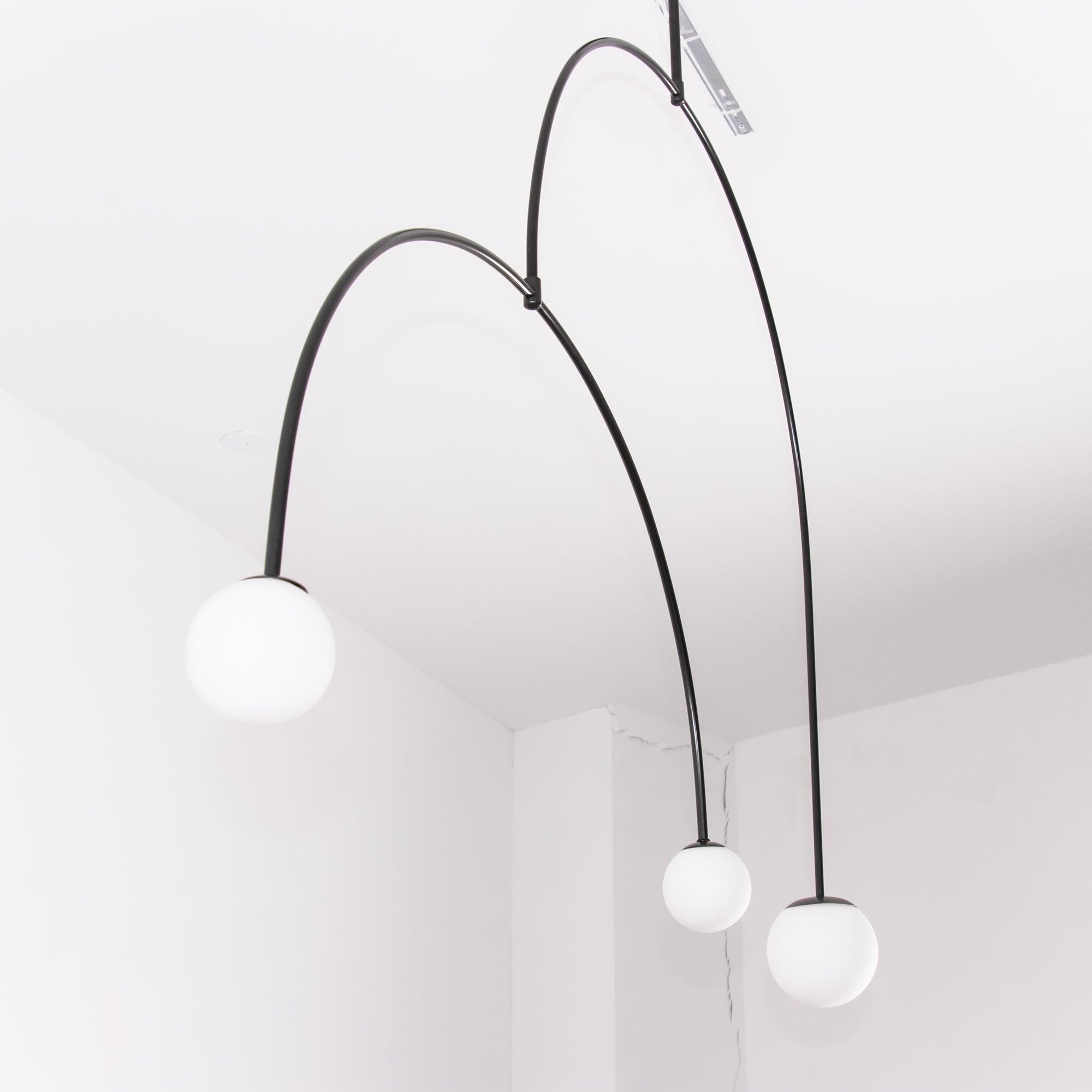 Mobile Chandelier 55.1 in L x 33.5 in H Patinated Brass Black Modern Living Room Ceiling Light Minimalist Glass Diffuser Fixture | Thomler