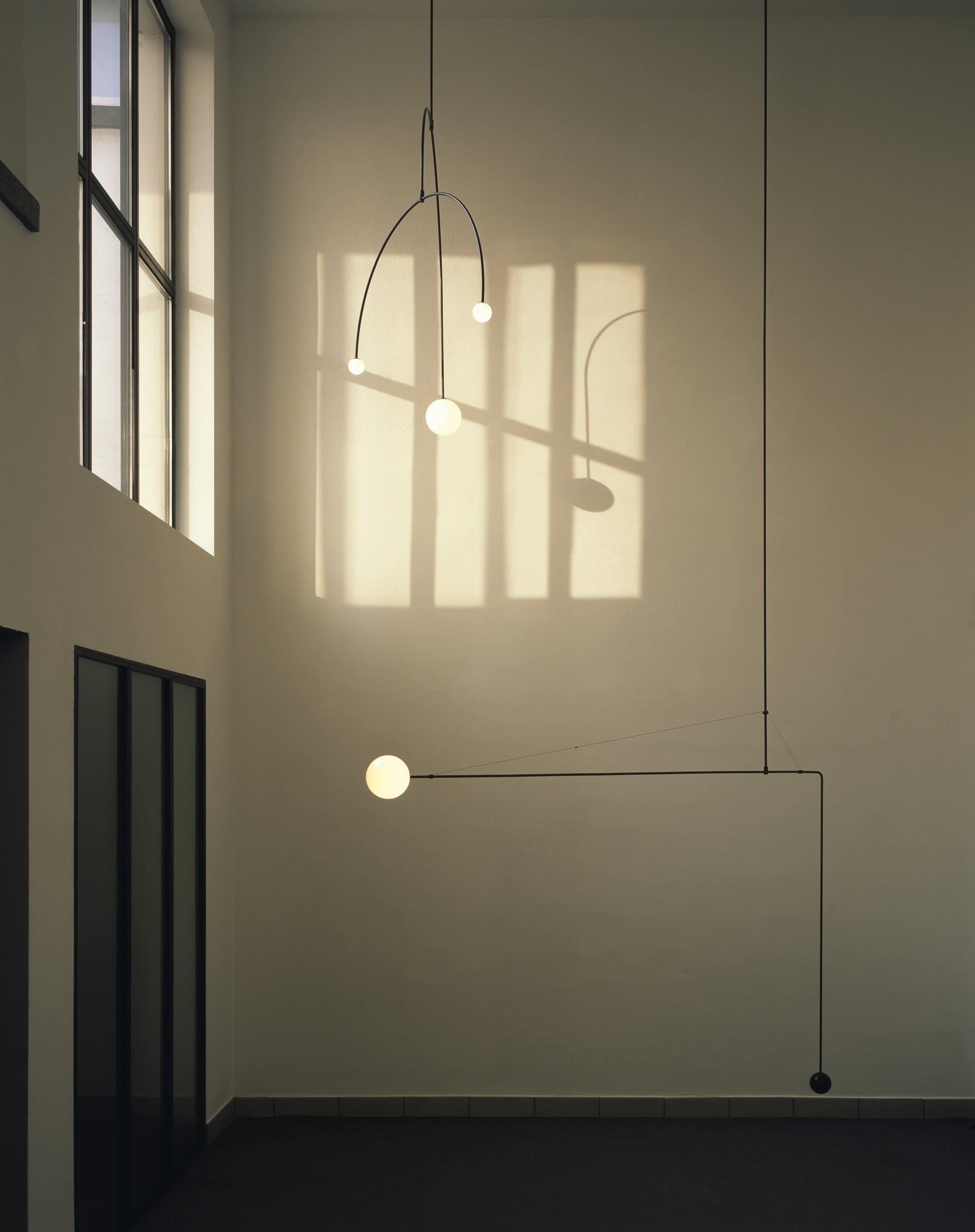 Mobile Chandelier 55.1 in L x 33.5 in H Patinated Brass Black Modern Living Room Ceiling Light Minimalist Glass Diffuser Fixture | Thomler