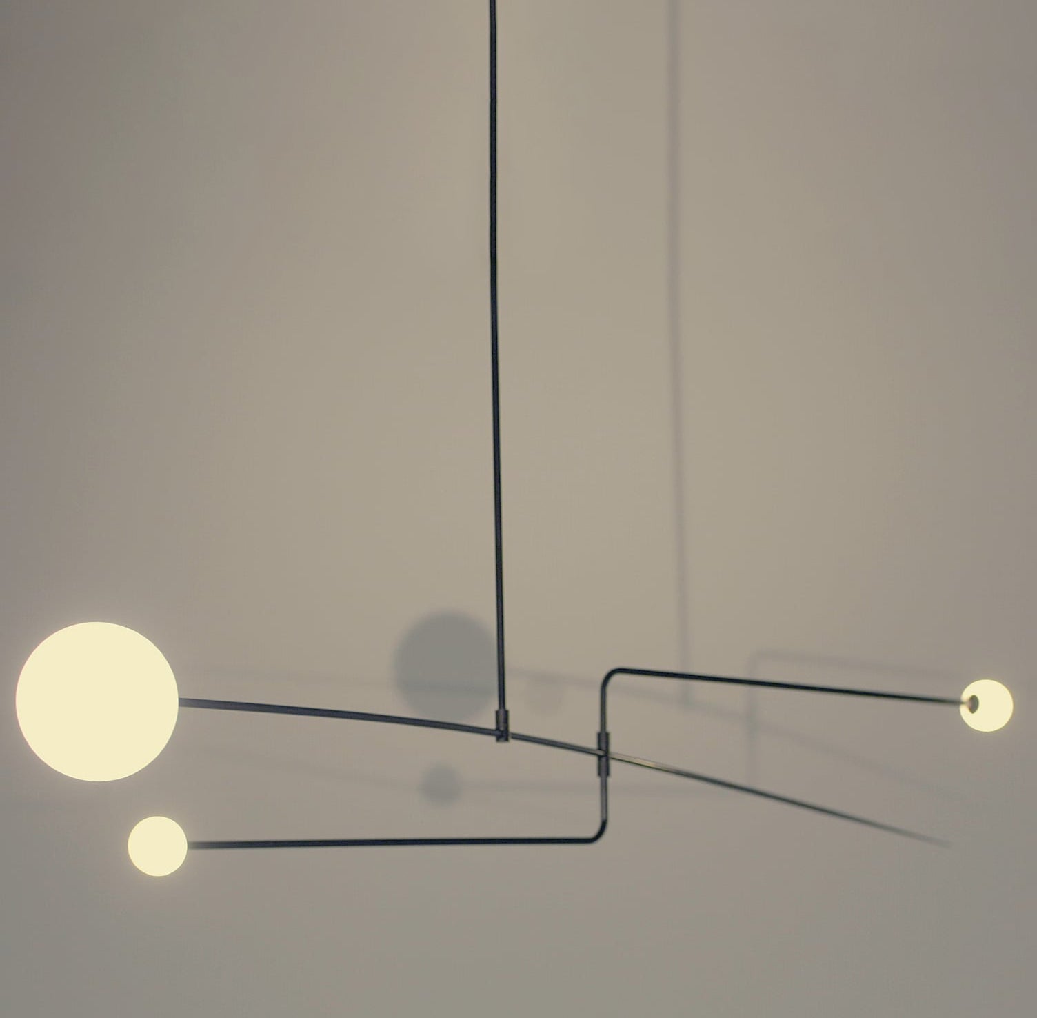 Mobile Chandelier 55.1 in L x 33.5 in H Patinated Brass Black Modern Living Room Ceiling Light Minimalist Glass Diffuser Fixture | Thomler