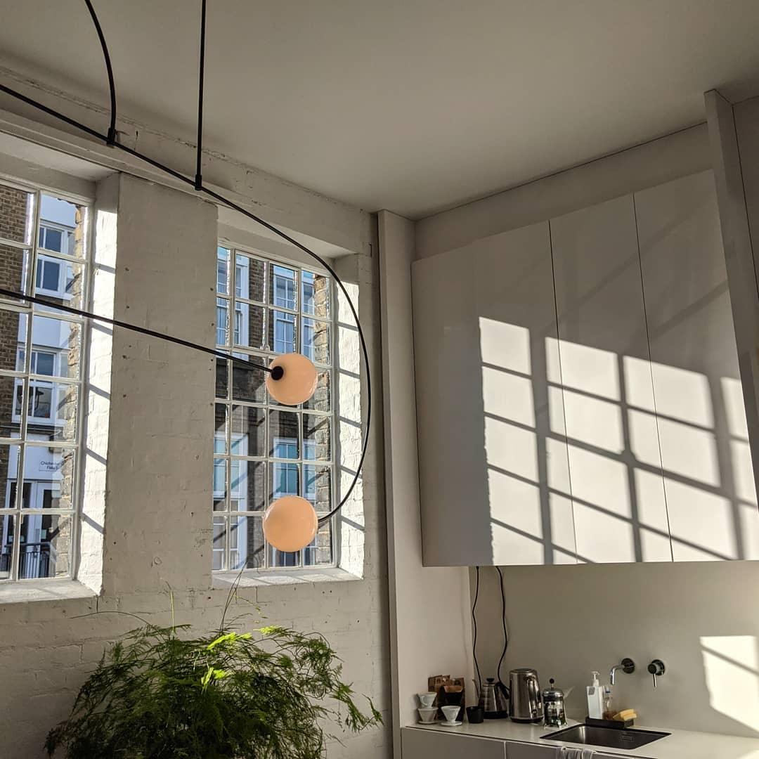 Mobile Chandelier 55.1 in L x 33.5 in H Patinated Brass Black Modern Living Room Ceiling Light Minimalist Glass Diffuser Fixture | Thomler