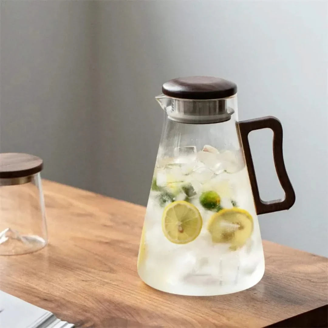 Heat-Safe Borosilicate Water Carafe with Wood Handle & Filter Lid – 68 oz Beverage Server for Juice, Iced Tea & Lemonade | Thomler