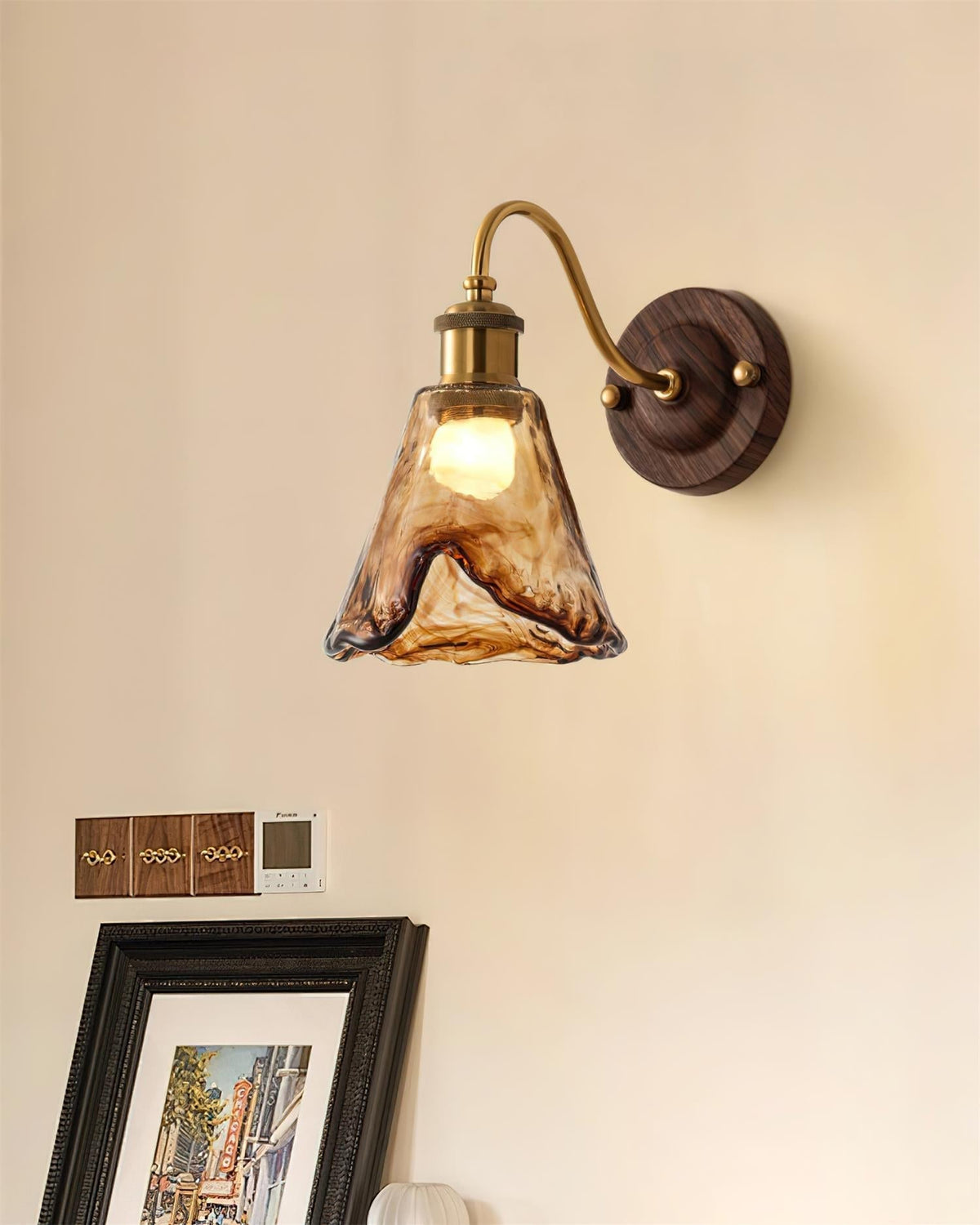 Vintage Amber Glass Wall Sconce with Wood-Tone Finish and Brass Accents | Thomler