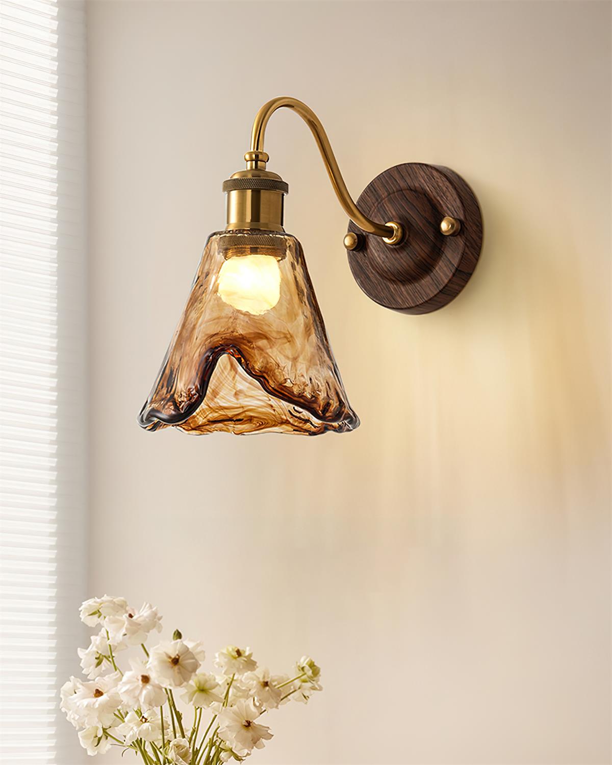 Vintage Amber Glass Wall Sconce with Wood-Tone Finish and Brass Accents | Thomler
