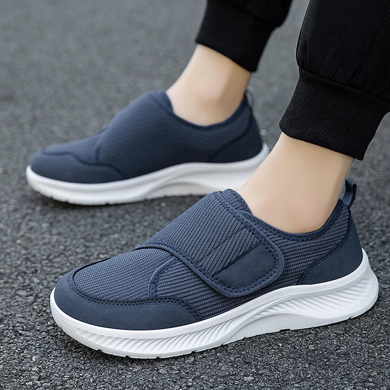 Heren ademende net‑vrijetijdsschoenen met brede teenkoker, verstelbare klittenbandsluiting, lichtgewicht schokabsorberende zool, orthopedische schoenen voor senioren, hallux valgus, gezwollen en diabetische voeten