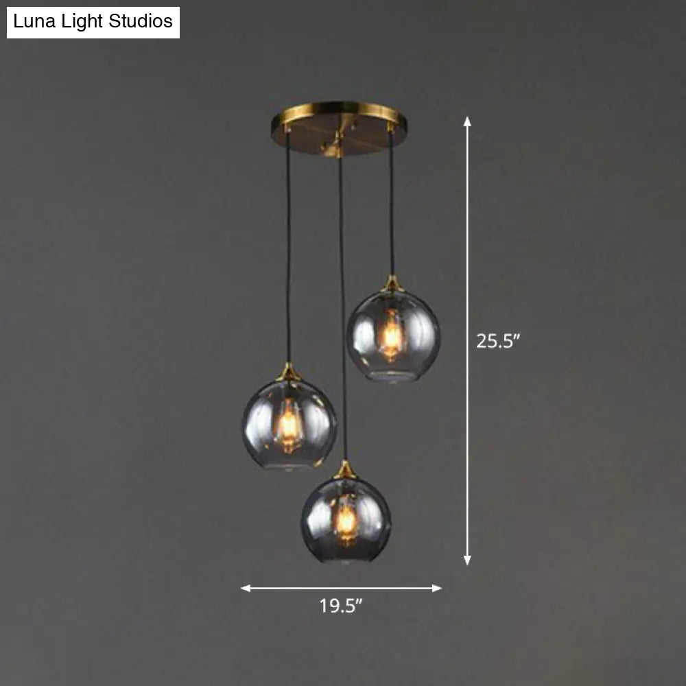 Three-Light Hanging Ceiling Fixture with Tapered Glass Globes in Antique Brass Finish for Dining Room Kitchen Island | Thomler