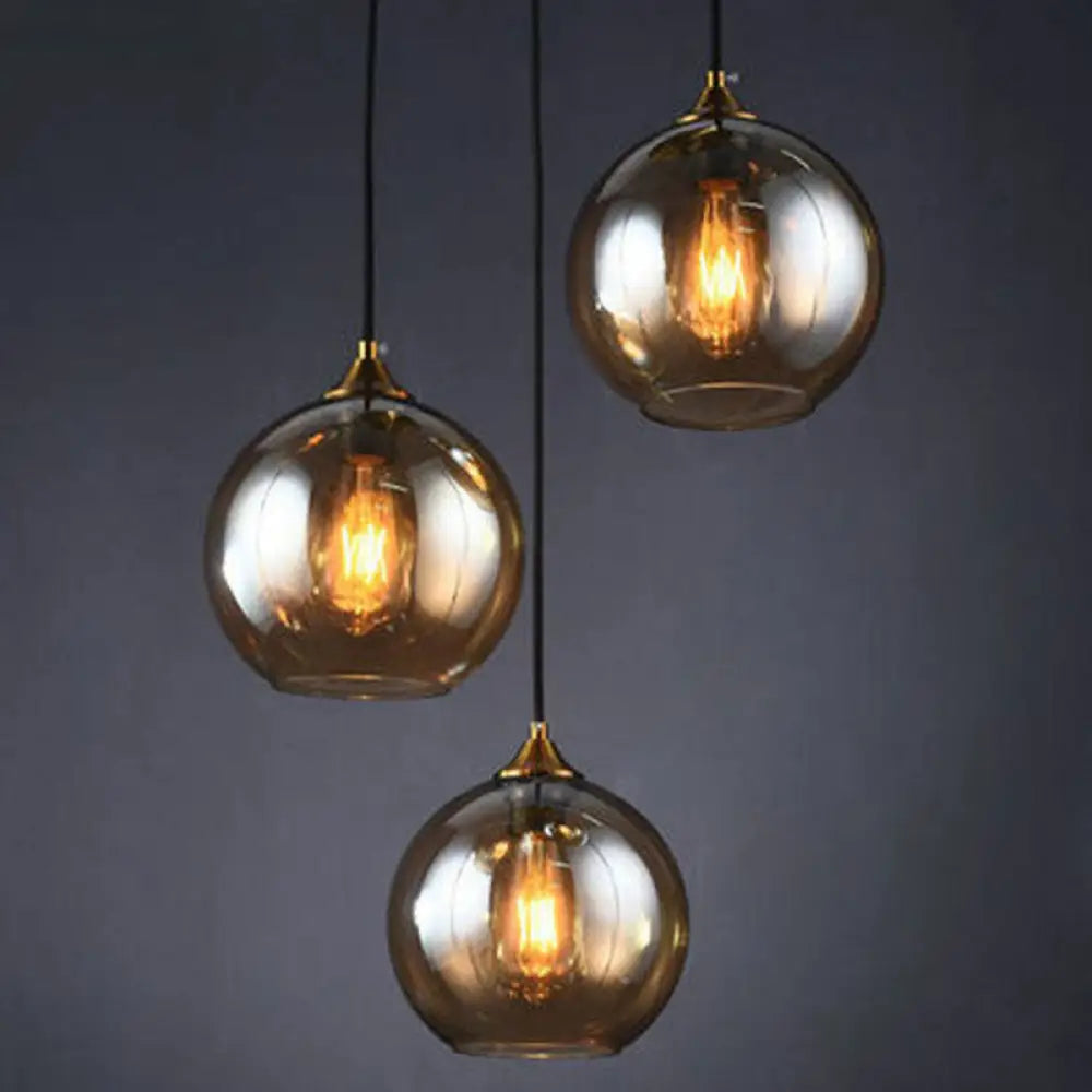 Three-Light Hanging Ceiling Fixture with Tapered Glass Globes in Antique Brass Finish for Dining Room Kitchen Island | Thomler