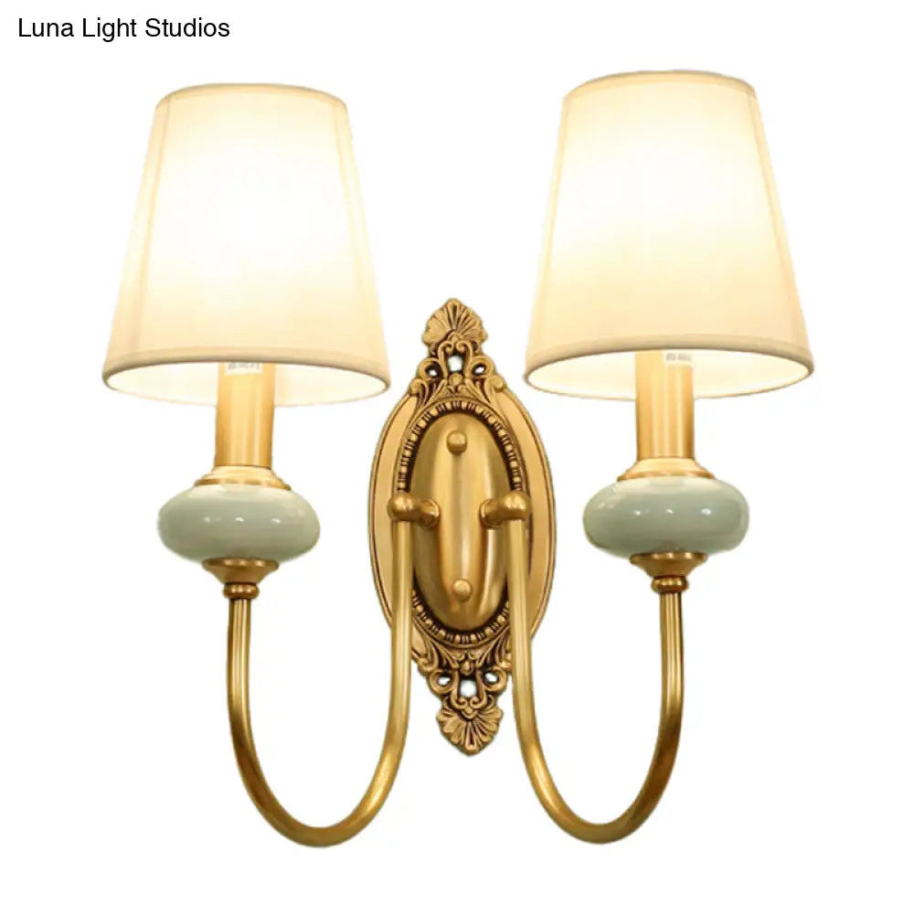 Curved Arm Wall Sconce with Fabric Shade & Jade Accent — 1 or 2 Lights — Brushed Brass Finish for Living Room, Bedroom, Hallway | Thomler