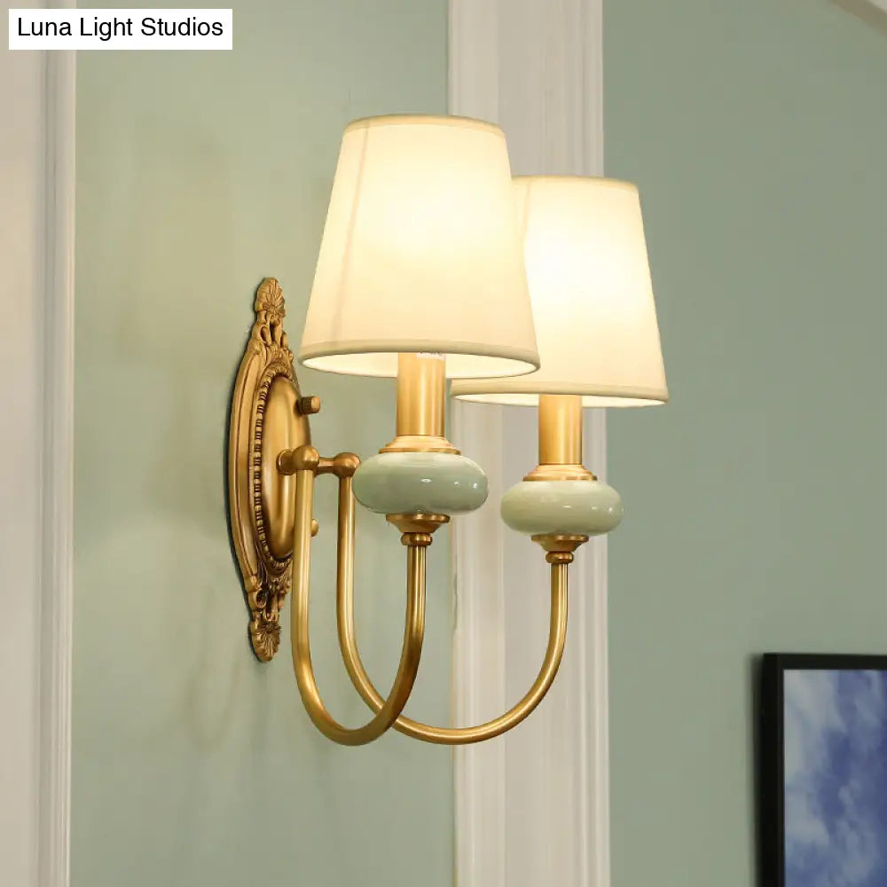 Curved Arm Wall Sconce with Fabric Shade & Jade Accent — 1 or 2 Lights — Brushed Brass Finish for Living Room, Bedroom, Hallway | Thomler
