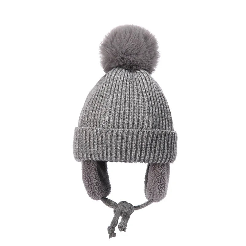 Plush-Lined Toddler Winter Cap with Chin Tie and Ear Covers – Warm Knitted Cold-Weather Headwear for Boys and Girls Age 2-8 | Thomler
