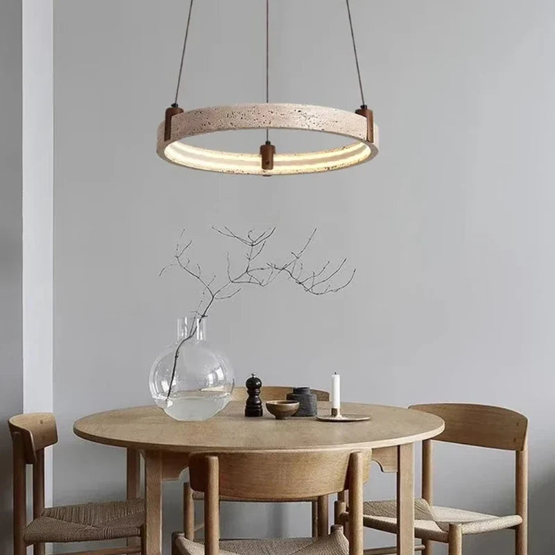 Circular Stone Pendant Light with Ambient Glow – Natural Travertine Ceiling Fixture for Modern Dining Rooms | Thomler